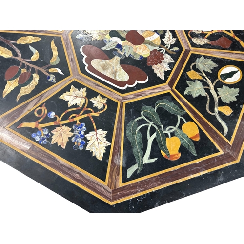 149 - A large Pietra Dura slate table top.Black slate, inlaid with various semi-precious stone. Depicting ... 