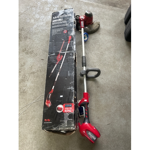 172 - A Mountfield mm48li cordless trimmer and pole pruner with a cordless strimmer