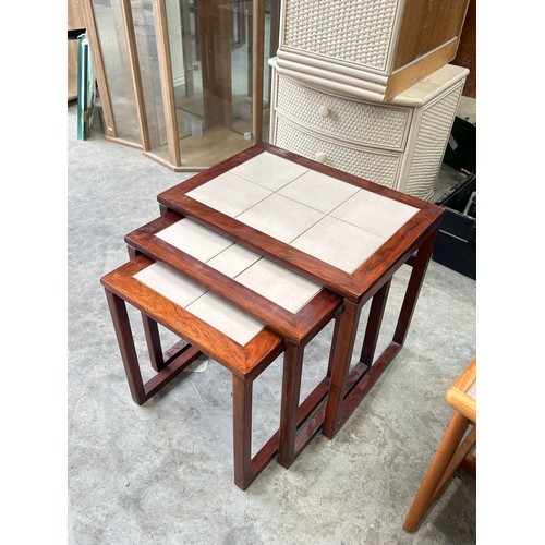 114 - Nest of 3 mid century tiled top tables largest 49cm height with 39.5cmx55cm top