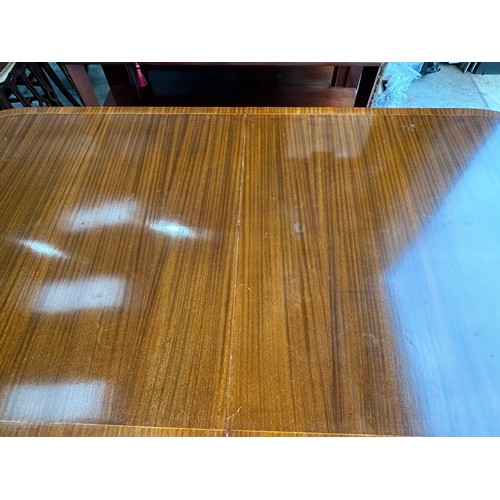 129 - Maple of London extending twin pedestal dining room table