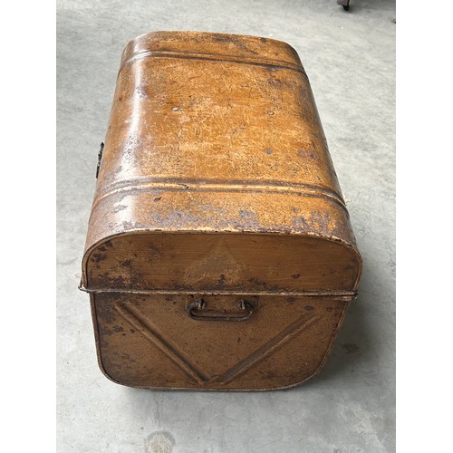 132 - Tin trunk painted faux wood with the key. approx 61cm wide x 43cm x 40cm