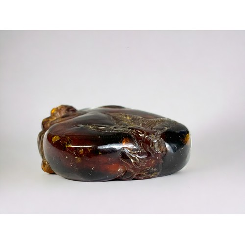 67 - Chinese carved amber miniature snuff bottle. Qing dynasty, 19th century. Carved with leaf design and... 