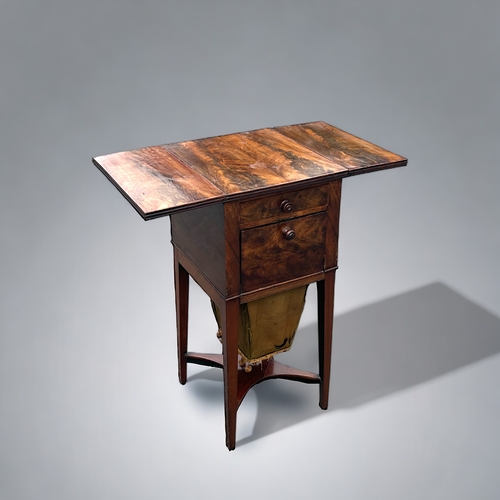 155 - A Regency period Walnut drop leaf work table.Single drawer and drop-front cupboard.