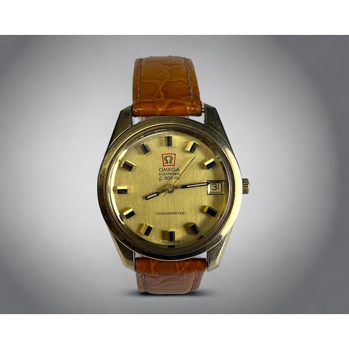 551 - A 1970's OMEGA F300HZ CHRONOMETER MENS WRISTWATCH. Gold case, with polished gold dial and raised bla... 