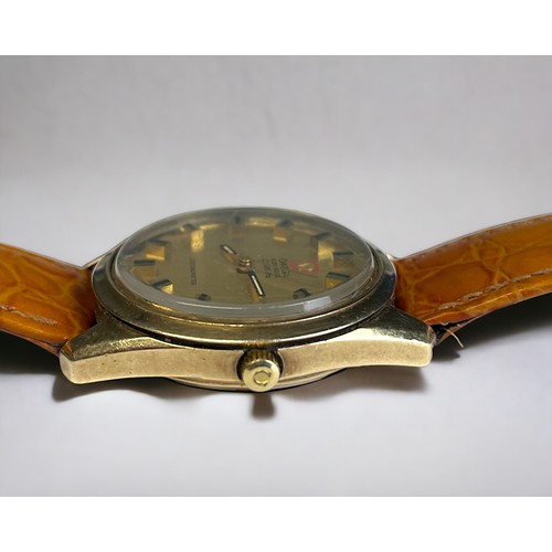 551 - A 1970's OMEGA F300HZ CHRONOMETER MENS WRISTWATCH. Gold case, with polished gold dial and raised bla... 