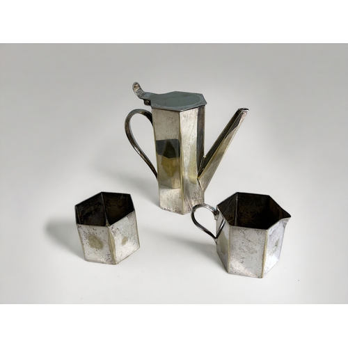 512 - An Art Deco miniature / Batchelors silver plate tea set.Roberst & Dore.Teapot height - 11.5cm... 