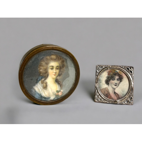 515 - Two 19th century French miniature portraits.One in a repousse sterling silver frame. The other set i... 