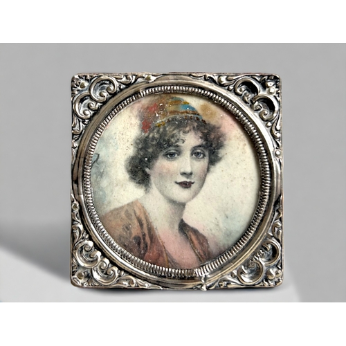 515 - Two 19th century French miniature portraits.One in a repousse sterling silver frame. The other set i... 