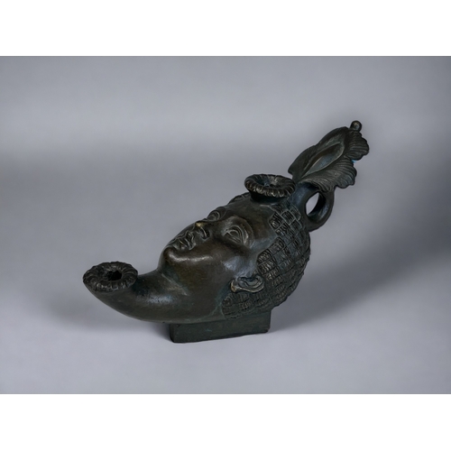 451 - A GRAND TOUR BRONZE 'ROMAN' OIL LAMP. 19th Century. Modelled as a woman's head with elaborate head d... 