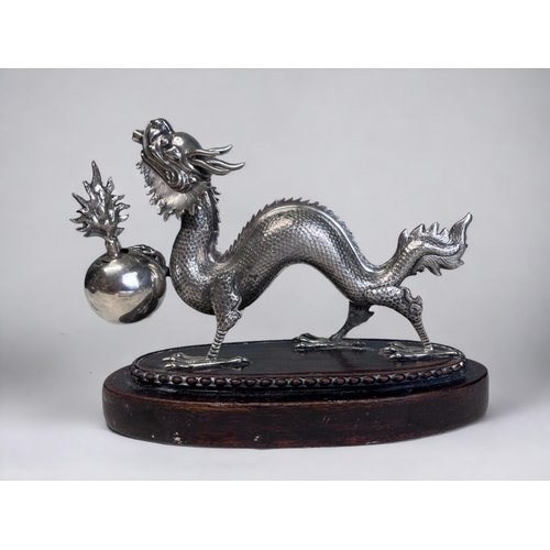 517 - A SCARCE 19TH CENTURY SILVER PLATE 'DRAGON' CIGAR LIGHTER. Originally made for the Officers mess tab... 