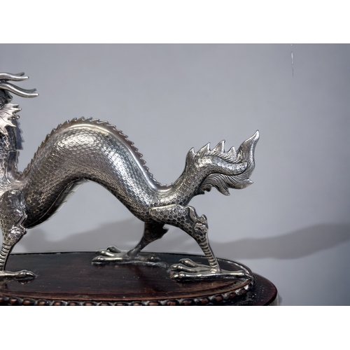 517 - A SCARCE 19TH CENTURY SILVER PLATE 'DRAGON' CIGAR LIGHTER. Originally made for the Officers mess tab... 