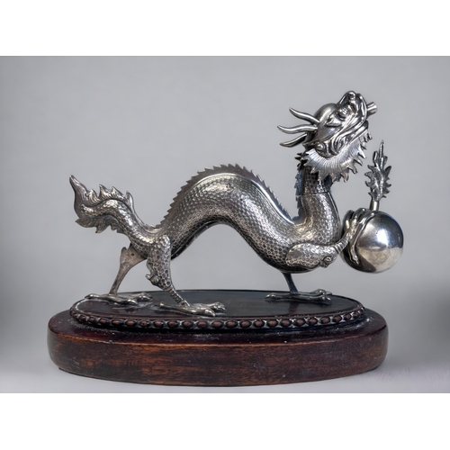 517 - A SCARCE 19TH CENTURY SILVER PLATE 'DRAGON' CIGAR LIGHTER. Originally made for the Officers mess tab... 