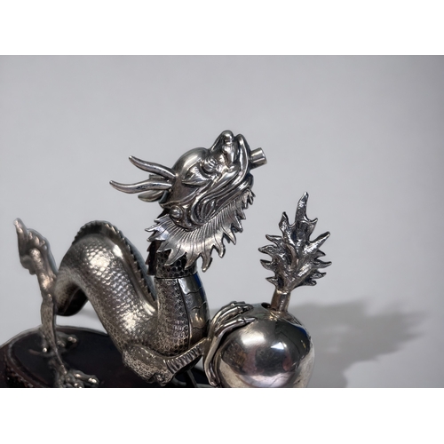 517 - A SCARCE 19TH CENTURY SILVER PLATE 'DRAGON' CIGAR LIGHTER. Originally made for the Officers mess tab... 