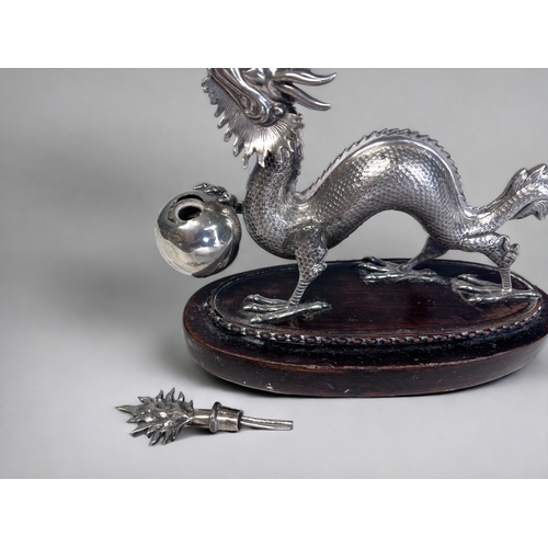 517 - A SCARCE 19TH CENTURY SILVER PLATE 'DRAGON' CIGAR LIGHTER. Originally made for the Officers mess tab... 