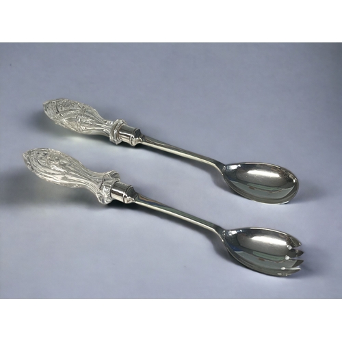 523 - A PAIR OF STERLING SILVER & CUT GLASS SALAD SERVERS. By Frank Cobb & Co, Sheffield. 1910, Sh... 