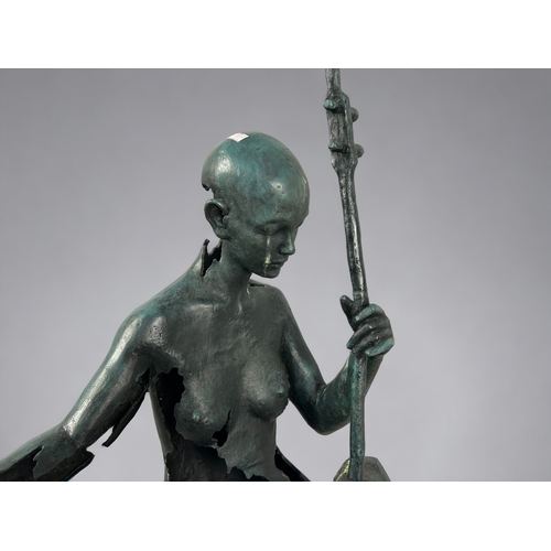 452 - A large, signed Le Bao Bronze abstract seated 'Musician' sculpture.Height - 86cm