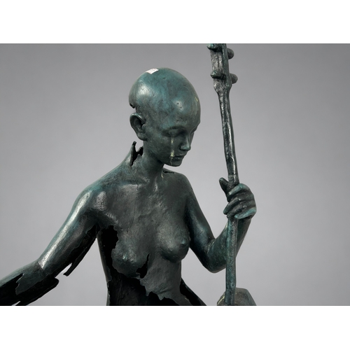 452 - A large, signed Le Bao Bronze abstract seated 'Musician' sculpture.Height - 86cm