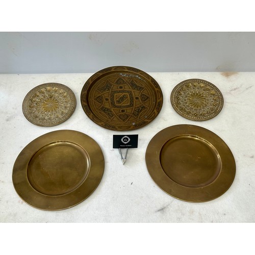 360 - A Large Copper inlaid on Brass Persian Platter and Indian Brass Hand Hammered plates with 2 other br... 