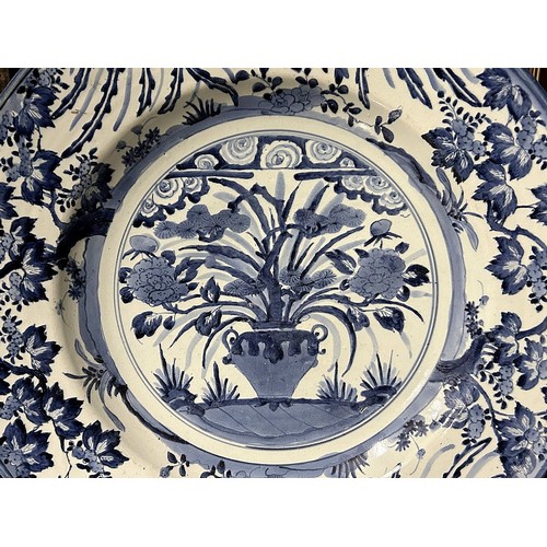 72 - A Large Japanese Arita porcelain charger.Edo period, C1670-1700.Painted in a rich cobalt, depicting ... 