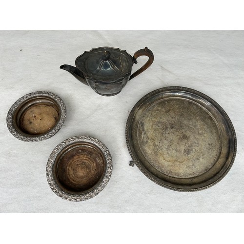 373 - Collection of silver plated dinner table accessories containing two Wine Bottle Coasters diameter 16... 