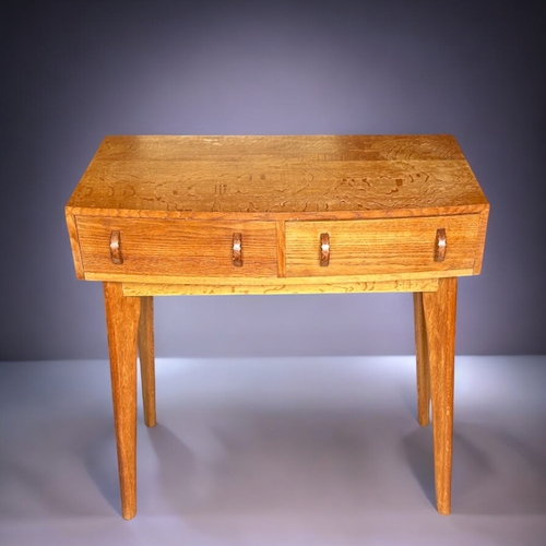 150A - A Mid-century Oak compact console table / desk.Attributed to Morris of Glasgow. H - 80cmW - 76c... 