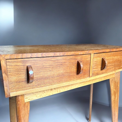 150A - A Mid-century Oak compact console table / desk.Attributed to Morris of Glasgow. H - 80cmW - 76c... 