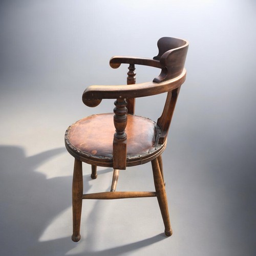 109 - Antique Beech Late 19th Century Smokers Bow Chair, having Leatherette and Studded upholstered circul... 