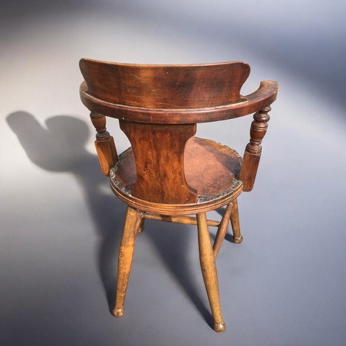 109 - Antique Beech Late 19th Century Smokers Bow Chair, having Leatherette and Studded upholstered circul... 