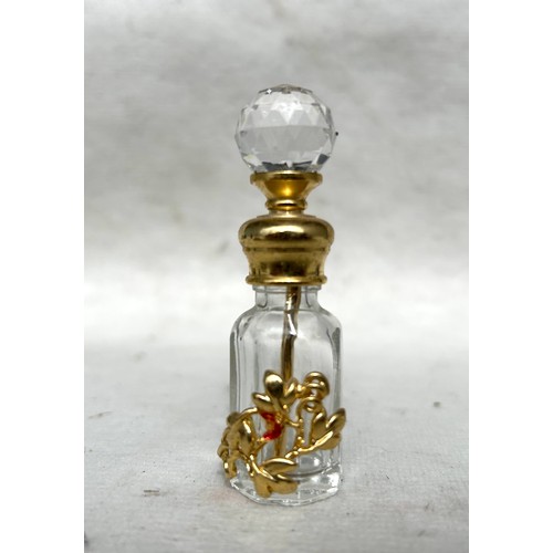 424 - A Chinese Glass Snuff bottle with a Collection of Mdina and other signed paper weights and perfume b... 