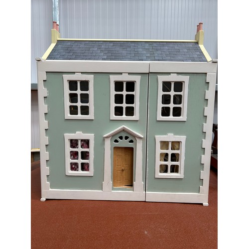 397 - A Large Vintage Doll House and Assorted Doll House Furniture - Good Condition 72cm x63cm x 32cm