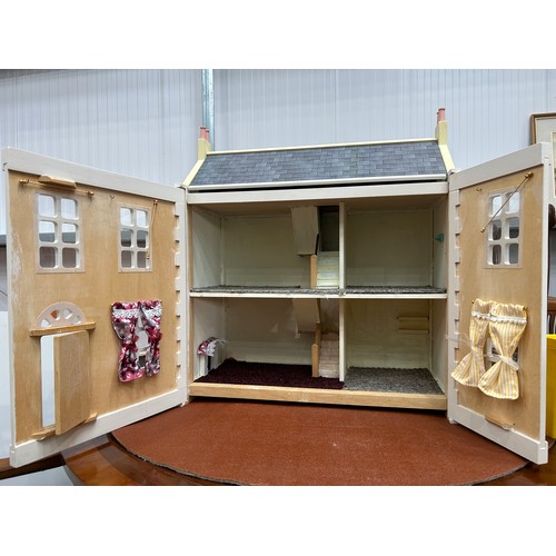 397 - A Large Vintage Doll House and Assorted Doll House Furniture - Good Condition 72cm x63cm x 32cm