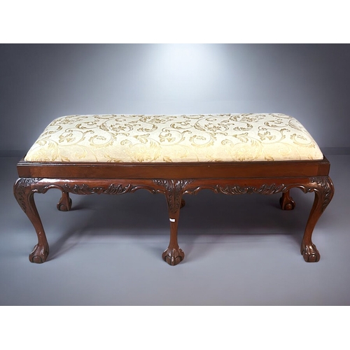 160A - A Chippendale style Mahogany Duet stool /bench.Upholstered seat, with six carved 'Fern' pattern legs... 