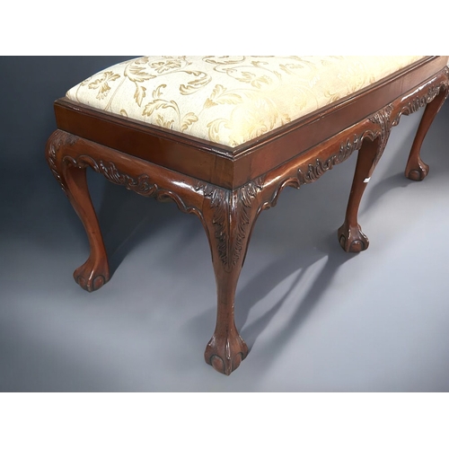 160A - A Chippendale style Mahogany Duet stool /bench.Upholstered seat, with six carved 'Fern' pattern legs... 