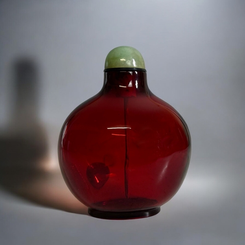 74 - A fine quality Chinese Red glass snuff bottle.Qing dynasty, Qianlong period. Bulbous form, with oval... 