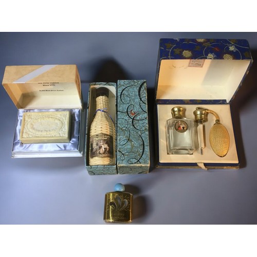 421 - Collection of Vintage Yardley collectibles. To include large sealed perfume bottle, and three other ... 