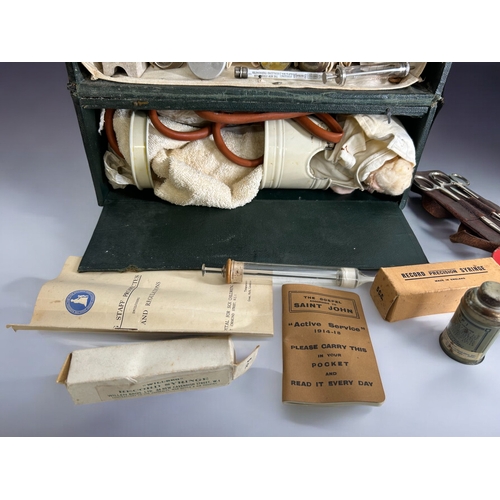 574 - A vintage leather field / Midwifery medical case.Complete with various medical equipment.