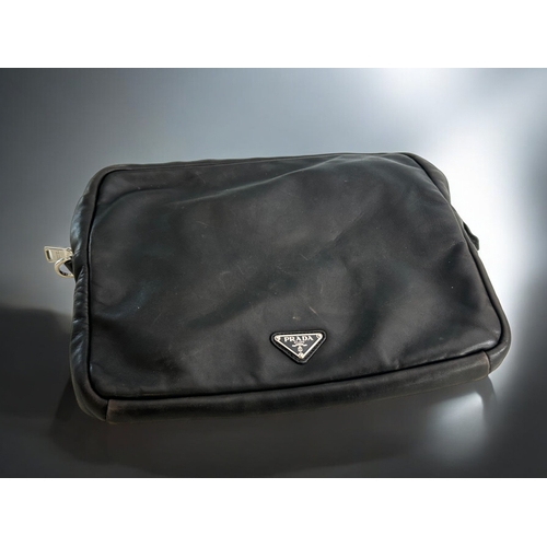 576 - A Prada 'Nuts & Bolts' leather clutch bag.H 12