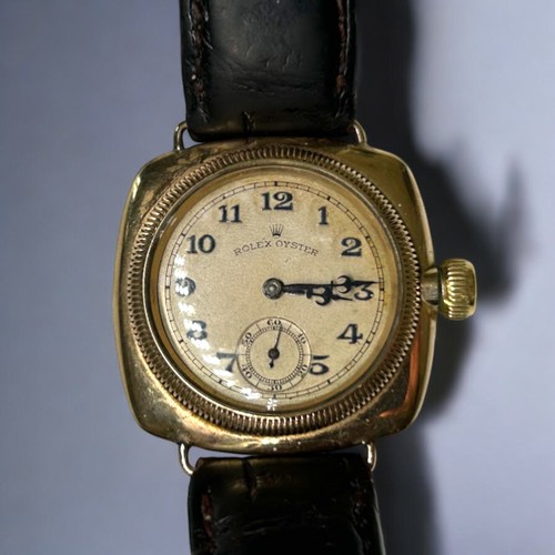 505A - 1920's 9carat gold Rolex Oyster Cushion wind wristwatch.Black roman numerals. Blue / black steel han... 