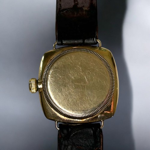 505A - 1920's 9carat gold Rolex Oyster Cushion wind wristwatch.Black roman numerals. Blue / black steel han... 