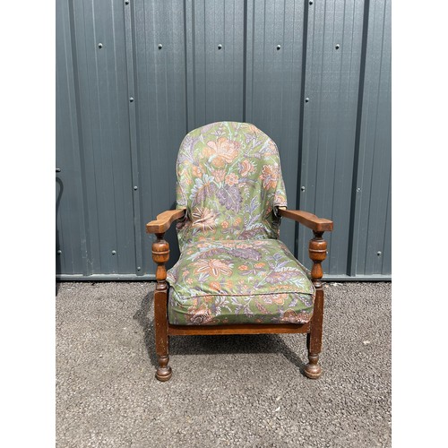 490 - Early 20th century upholstered oak armchair with sprung seat, hand sawn velcroed cover