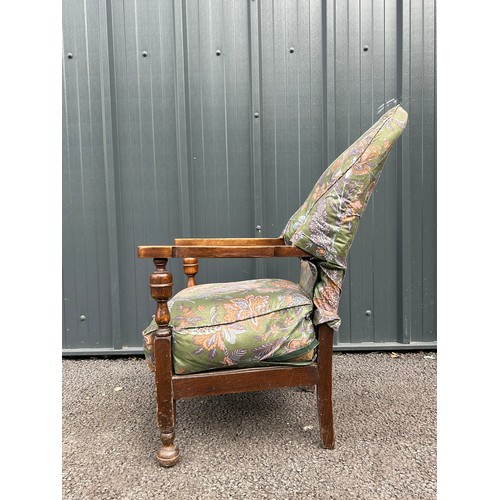 490 - Early 20th century upholstered oak armchair with sprung seat, hand sawn velcroed cover