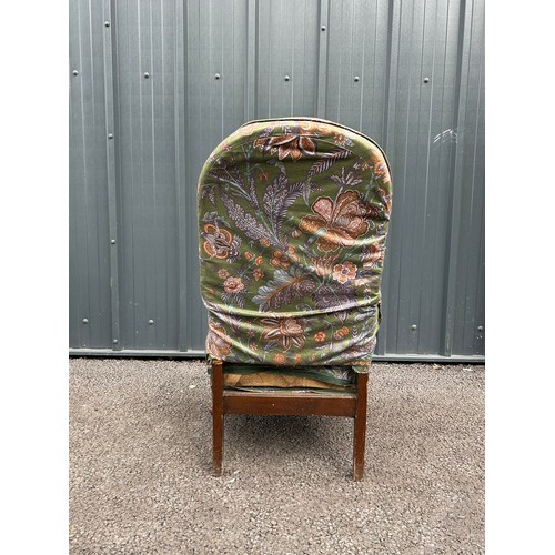 490 - Early 20th century upholstered oak armchair with sprung seat, hand sawn velcroed cover