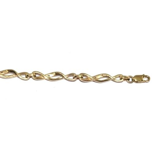 35 - 9ct gold and diamond Celtic style lobster claw bracelet with diamond insert. 7 inches long 5.7g