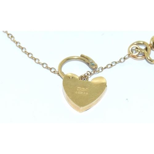 6 - 9ct gold ladies bracelet complete with padlock and safety chain 9.2g