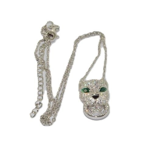 82 - Silver Leopards head ,set with Emerald eyes