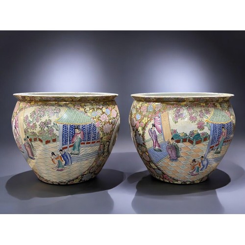 50A - A very large pair of Chinese 'Canton' porcelain fish bowls.Hand painted court scenes, with floral bo... 