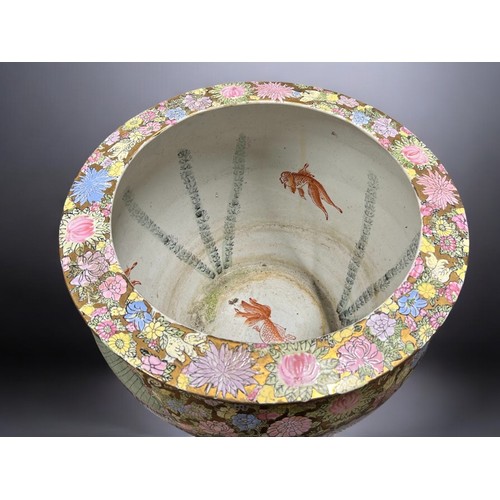 50A - A very large pair of Chinese 'Canton' porcelain fish bowls.Hand painted court scenes, with floral bo... 