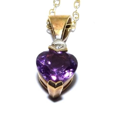 7 - 9ct gold Amethyst and Diamond pendant necklace on a 40cm chain