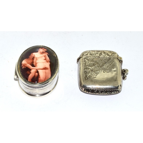 207 - Silver enamel oval pill box with an erotic front design together a silver vesta case