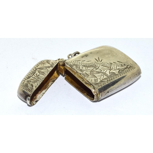 207 - Silver enamel oval pill box with an erotic front design together a silver vesta case